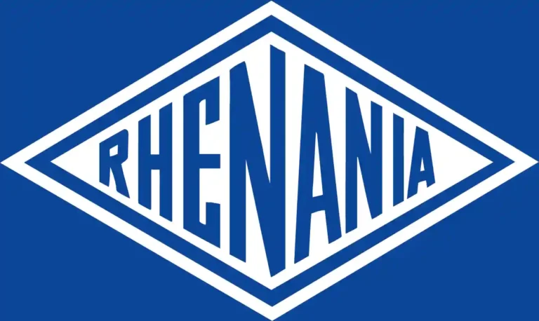 Das Logo zeigt den Schriftzug „RHENANIA“ in markanten, blauen Großbuchstaben, die in einer weißen Rautenform angeordnet sind und auf einem blauen Hintergrund liegen.
